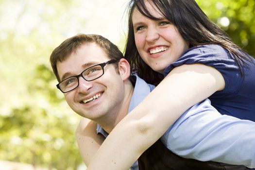 Attractive Young Couple Having Fun Outside in the Park