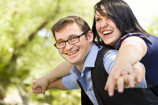 Attractive Young Couple Having Fun Outside in the Park