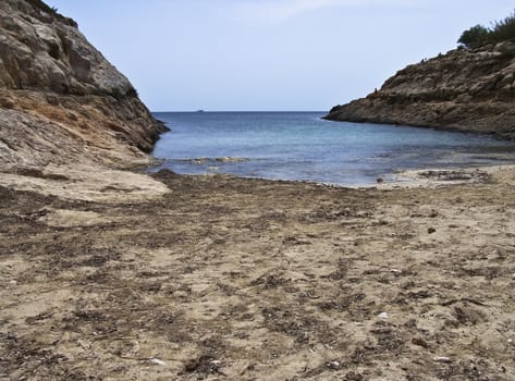 cove with a beach in Lampedusa. near a camping.