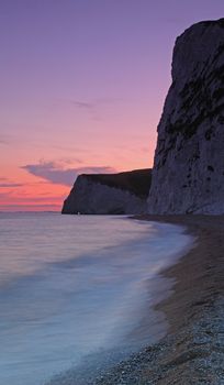 Sunset over cliffs at Dorset England