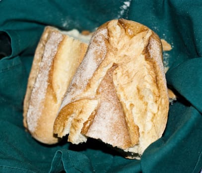 Sicilian bread cut on a white background
