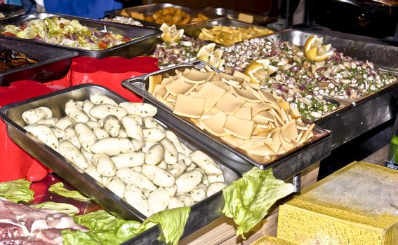 Traditional Sicilian food: panelle, crocchette and babbaluci