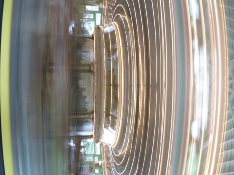 Antique carousel with carved horses at Glen Echo National Park in Maryland with motion blur