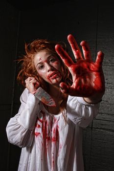 Woman in Horror Situation With Bloody Face