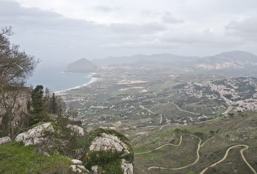Italy, Sicily, view of Cofano mount and the Tyrrhenian coastline from Erice. Trapani