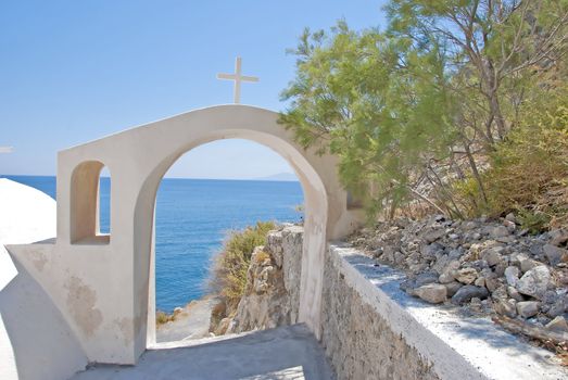 The Beautiful Aegean Sea through a Greek Church Archway