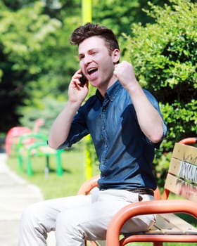 Happy young man in the park