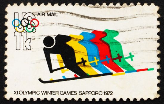 UNITED STATES OF AMERICA - CIRCA 1972: a stamp printed in the USA shows Skiing and Olympic Rings, 20th Summer Olympic Games, Munich, Germany, circa 1972