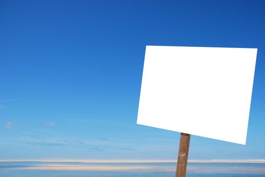 empty sign at the beach isolated on white (blue sky background, copy-space available for design)