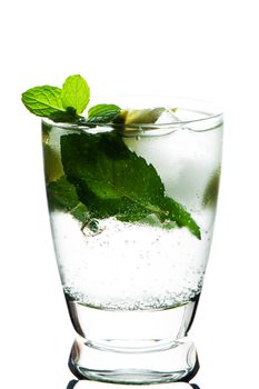 Closeup of Mojito with limes and mint on White background