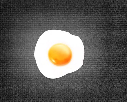top view of fried eggs on gray background.