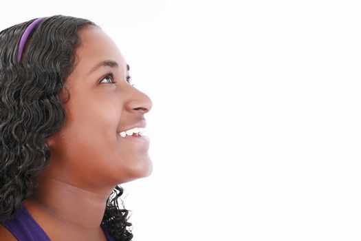 Happy african girl looking up, isolated on white