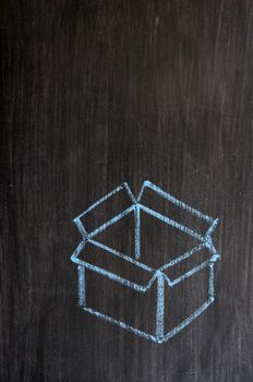 Concept of "Think outside the box" drawn with chalk on a blackboard 