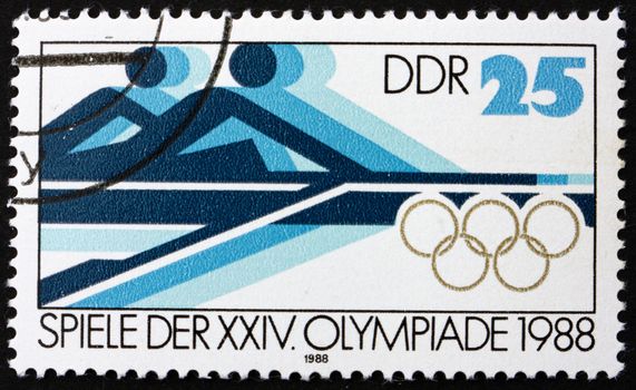 GDR - CIRCA 1988: a stamp printed in GDR shows Rowing, 24th Summer Olympics, Seoul, South Korea, circa 1988