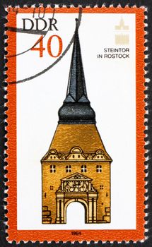 GDR - CIRCA 1984: a stamp printed in GDR shows Stone Gate, Rostock, circa 1984