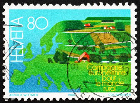 SWITZERLAND - CIRCA 1988: a stamp printed in the Switzerland shows Europe, European Campaign to Protect Undeveloped and Developing Lands, circa 1988