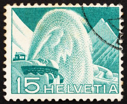 SWITZERLAND - CIRCA 1949: a stamp printed in the Switzerland shows Rotary Snow Plow, circa 1949