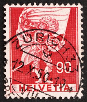 SWITZERLAND - CIRCA 1959: a stamp printed in the Switzerland shows Standard Bearer, circa 1959
