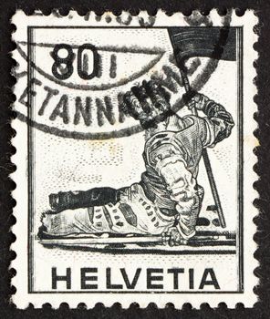 SWITZERLAND - CIRCA 1958: a stamp printed in the Switzerland shows Dying Warrior, circa 1958