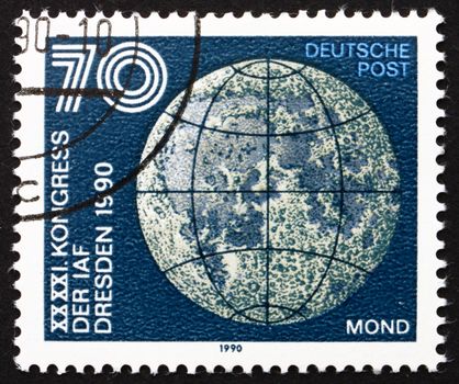 GDR - CIRCA 1990: a stamp printed in GDR shows Moon, 41st Congress of International Astronautics Federation, Dresden, circa 1990