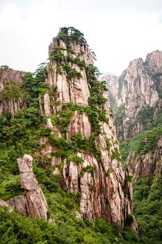 Huangshan mountain peak in a valley in China