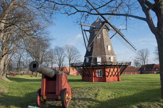 Windmill and old gun in Kastellet fortress in Copenhagen