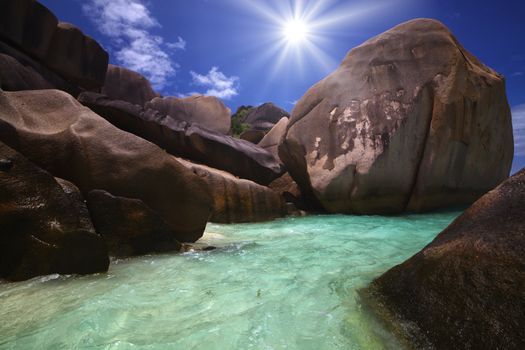 Giant rocks rolled down to the oceans shore worn smooth from eons of waves and weather