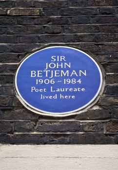 Sir John Betjeman plaque in Cloth Fair, London.