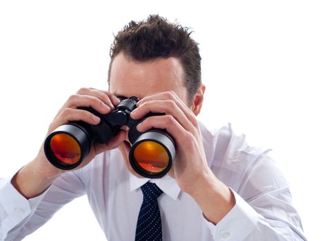 Businessman looking through binoculars isolated on white background