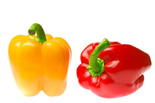excellent red and yellow peppers the covered drops of water on a white background