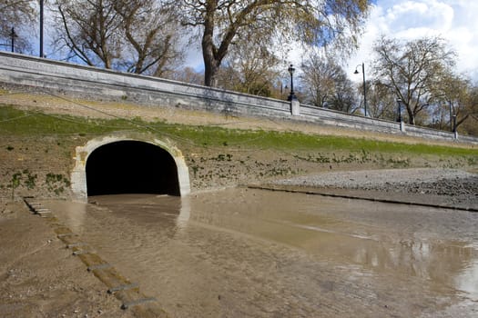 The outlet of the River Westbourne into the Thames.