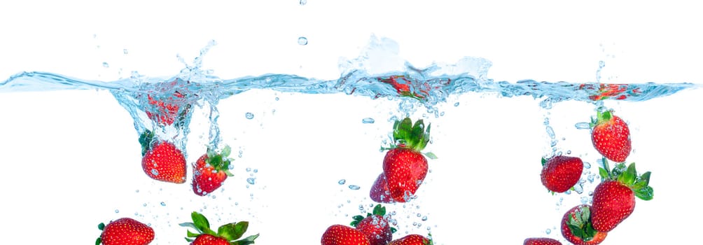 Collage Fresh Strawberry Dropped into Water with Splash on white backgrounds