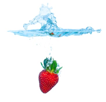 Fresh Strawberry Dropped into Water with Splash on white backgrounds