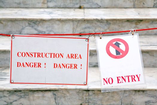 Signs announce that construction has been banned from entering inside.