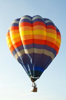 Colorful hot air balloon on blue sky