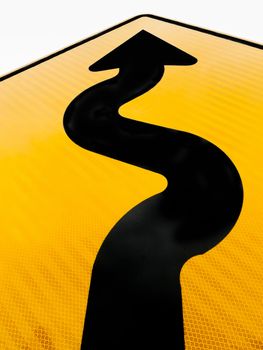 Wavy arrow on road sign pointing upward in a concept of achievement, advancement and success