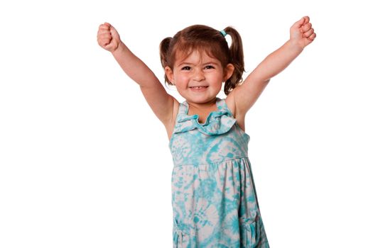 Cute beautiful funny happy little toddler girl celebrating with hand up in air, isolated.