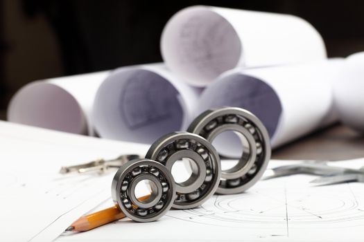 Tools and papers with sketches on the table