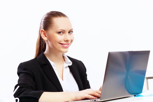 Business woman working on computer in office