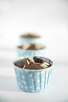 Cup cake, chocolate, blue cup.