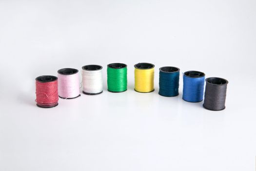 Roll thread used for sewing are available in various colors.