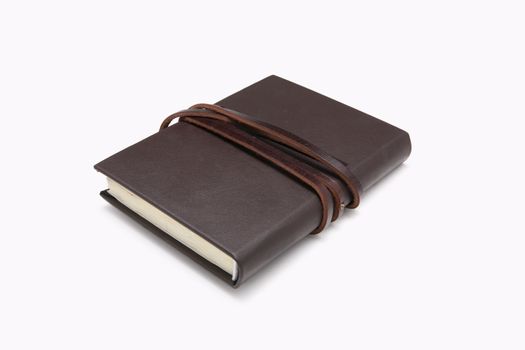 Secret brown leather book with white background.