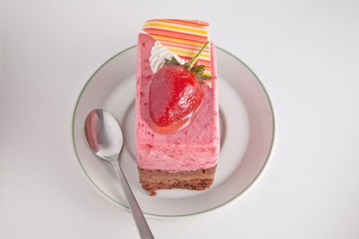 Strawberry mousse cake with chocolate.