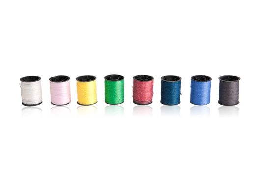 Roll thread used for sewing are available in various colors.