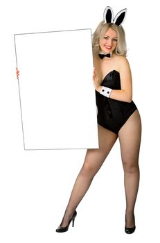 Sexy blonde girl in the costume of a rabbit with a poster in his hands