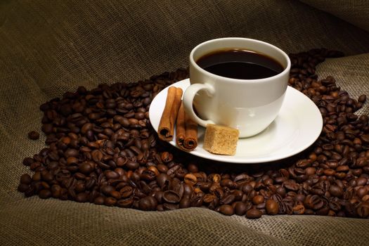 Image of coffee beans and white cup