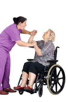 Elder abuse concept: enraged nurse or other healthcare provider assaulting a senior woman patient in a wheelchair, studio shot on white.