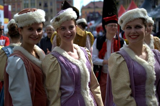 WROCLAW, POLAND - JUNE 15:  Beautiful Polish girls from Folk Dance and Song group "Jedliniok" visit fanzone of Euro 2012 on June 15, 2012 in Wroclaw.  