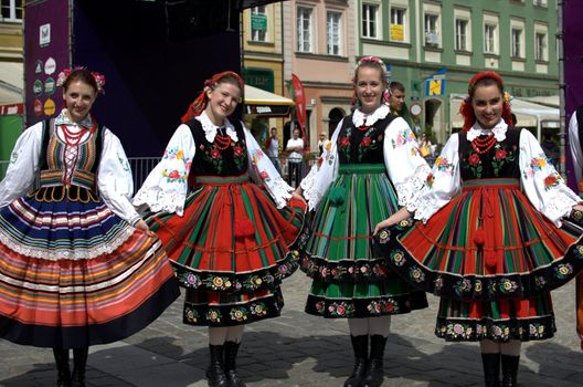 WROCLAW, POLAND - JUNE 15:  Members of Folk Dance group "Wroclaw" pose for photo in traditional outfit on June 15, 2012 in Wroclaw.  