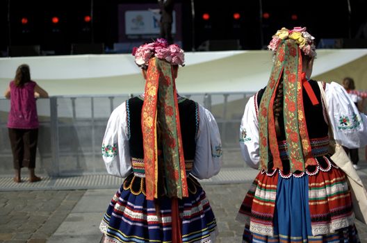 WROCLAW, POLAND - JUNE 15:  Members of "Wroclaw" folk dance group visit Euro 2012 fanzone on June 15, 2012 in Wroclaw.  